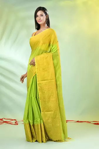Light green cotton saree with zari borders