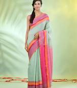 Pistachio green cotton saree with temple borders