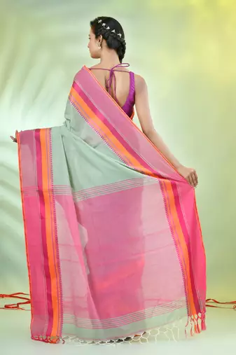 Pistachio green cotton saree with temple borders