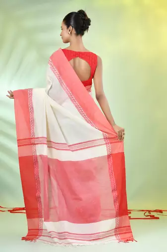 Off white cotton saree with temple borders
