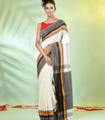 Off white cotton saree with temple borders