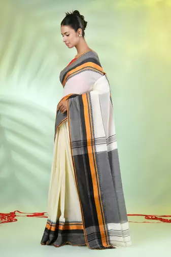 Off white cotton saree with temple borders