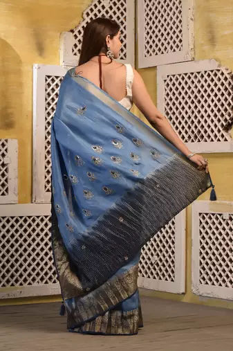 Blue shaded hand embroidered saree with blouse piece