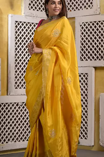 Mustard yellow hand embellished pittan work silk saree with blouse piece