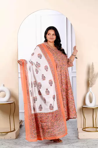 Womens plus size surpassing orange colored partywear floral printed cotton kurta dupatta set