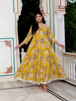 Womens cotton gotapatti and lace border details floral printed yellow anarkali kurta 1