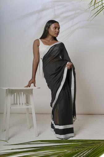 Black solid pure cotton saree with white border without blouse