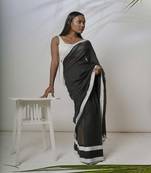 Black solid pure cotton saree with white border without blouse