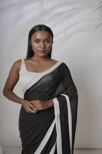 Black solid pure cotton saree with white border without blouse