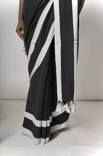 Black solid pure cotton saree with white border without blouse