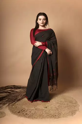 Black solid cotton saree with ethnic motifs without blouse