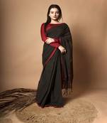 Black solid cotton saree with ethnic motifs without blouse