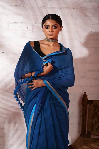 Light blue cotton saree with grey and blue border Without blouse