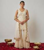 Ivory sequin and thread georgette kurta sharara set