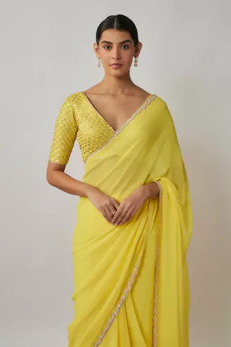 Lemon yellow sequin and zari embroidered georgette saree set