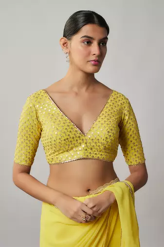 Lemon yellow sequin and zari embroidered georgette saree set