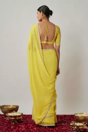 Lemon yellow sequin and zari embroidered georgette saree set
