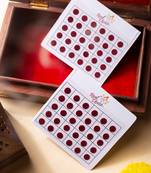 Small round maroon bindi leaflet