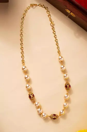 Pearl necklace with stone-studded gold balls