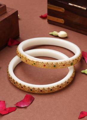 White bangles with gold embellishments and floral designs 3