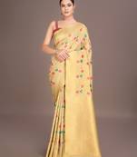 Exquisite designs with this regal cream rich look banarasi tissue silk saree