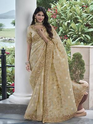 Cream embroidered silk blend saree 1