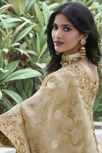 Cream embroidered silk blend saree