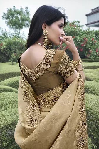 Brown embroidered silk blend saree