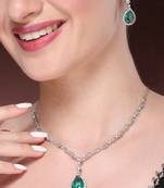 Women's silver-plated green american diamond-studded handcrafted jewellery set