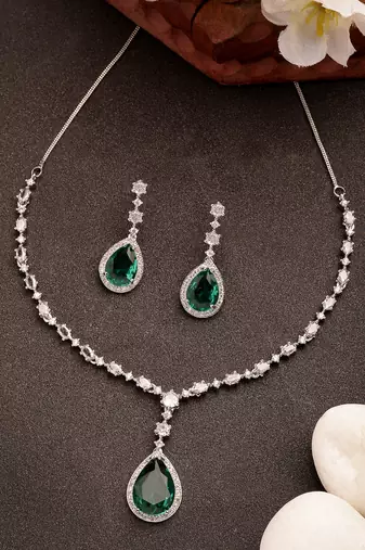 Women's silver-plated green american diamond-studded handcrafted jewellery set