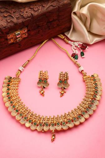Women's gold-plated green stone studded handcrafted temple jewellery set