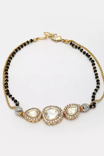 Women gold-plated & black brass ad-studded hand mangalsutra link bracelet