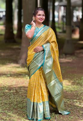 Yellow tissue silk blend traditionally rich Woven zari saree 1