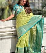 Green tissue silk traditionally rich Woven jari designer saree