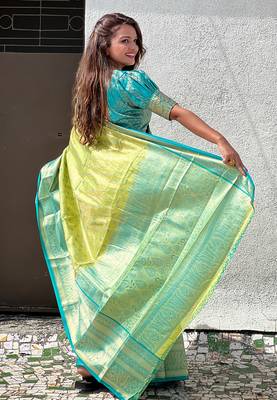 Green tissue silk blend traditionally rich Woven zari saree 2