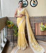Yellow color simmer silk bollywood style partywear saree with thread embroidery cut work