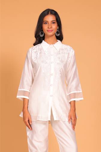 White coset hand embroidery