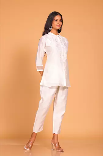 White coset hand embroidery