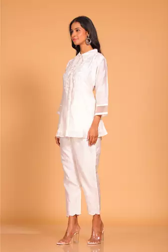 White coset hand embroidery