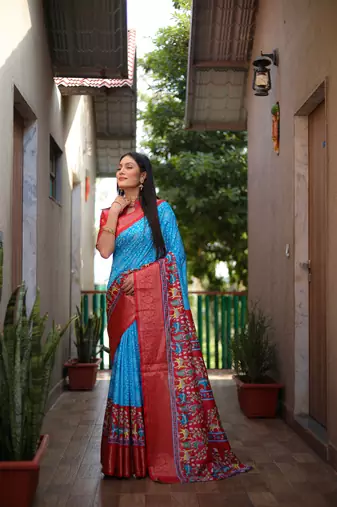 Blue dola silk blend Woven border saree with digital kalamkari and bandhej print