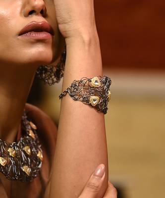 Gold and black radiant mesh kundan bracelet 1