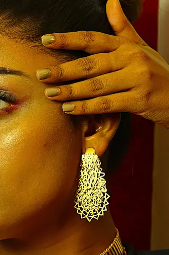 Gold regal earring