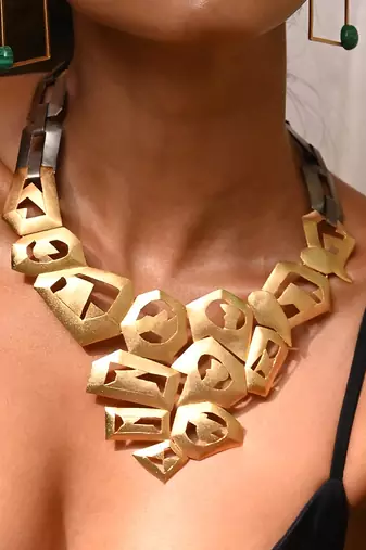 Gold and black streaming neckpiece