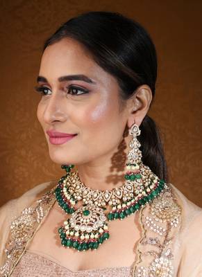 Bridal choker with kundan and american stones featuring green drops 3