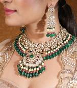 Bridal choker with kundan and american stones featuring green drops