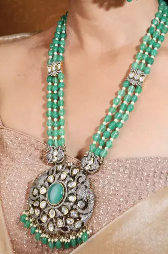 Mint green bead necklace with american stone studded elephant motif pendant