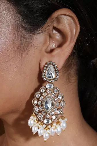 Bridal necklace set with earrings and maang tikka in american diamond stones