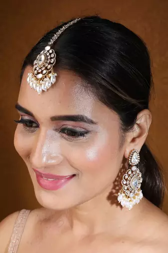 Bridal necklace set with earrings and maang tikka in american diamond stones