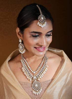 Bridal necklace set with earrings and maang tikka in american diamond stones 4