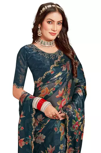 Turquoise embroidered organza saree with blouse